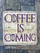 Load image into Gallery viewer, Coffee Is Coming Cork Drink Coasters - Set Of Four
